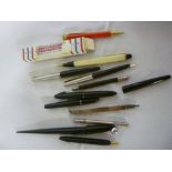 A selection of various pens and pencils including sterling silver propelling pencil with engraved
