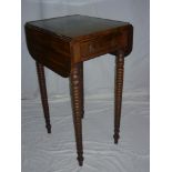 A small Victorian mahogany drop leaf centre table with a single drawer in the frieze on bobbin