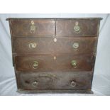 A William & Mary inlaid walnut chest of two short and three long drawers with brass ring handles (