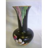 A Falconware pottery tapered vase with "The Dell" painted floral decoration