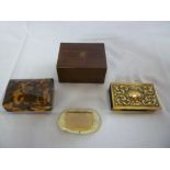 A 19th century miniature tortoiseshell rectangular table box with hinged lid on miniature