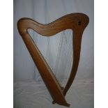 A good quality 34 string harp by Pilgrim Harps 43" high over all