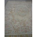 An old Indian chain-stitch wool carpet with floral decoration (af) 12' x 9'