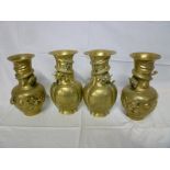 Two pairs of Japanese brass baluster shaped vases, each with engraved decoration and entwined dragon