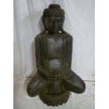 A large carved wood figure of a Buddha, 40" high