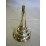 A Georgian silver circular two-piece wine funnel with gadrooned edge and scallop bracket, London