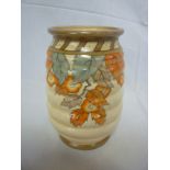 A Crown Ducal pottery F. Rhead-style ribbed vase with painted floral decoration