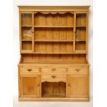 A late 19th Century pine dresser, the up