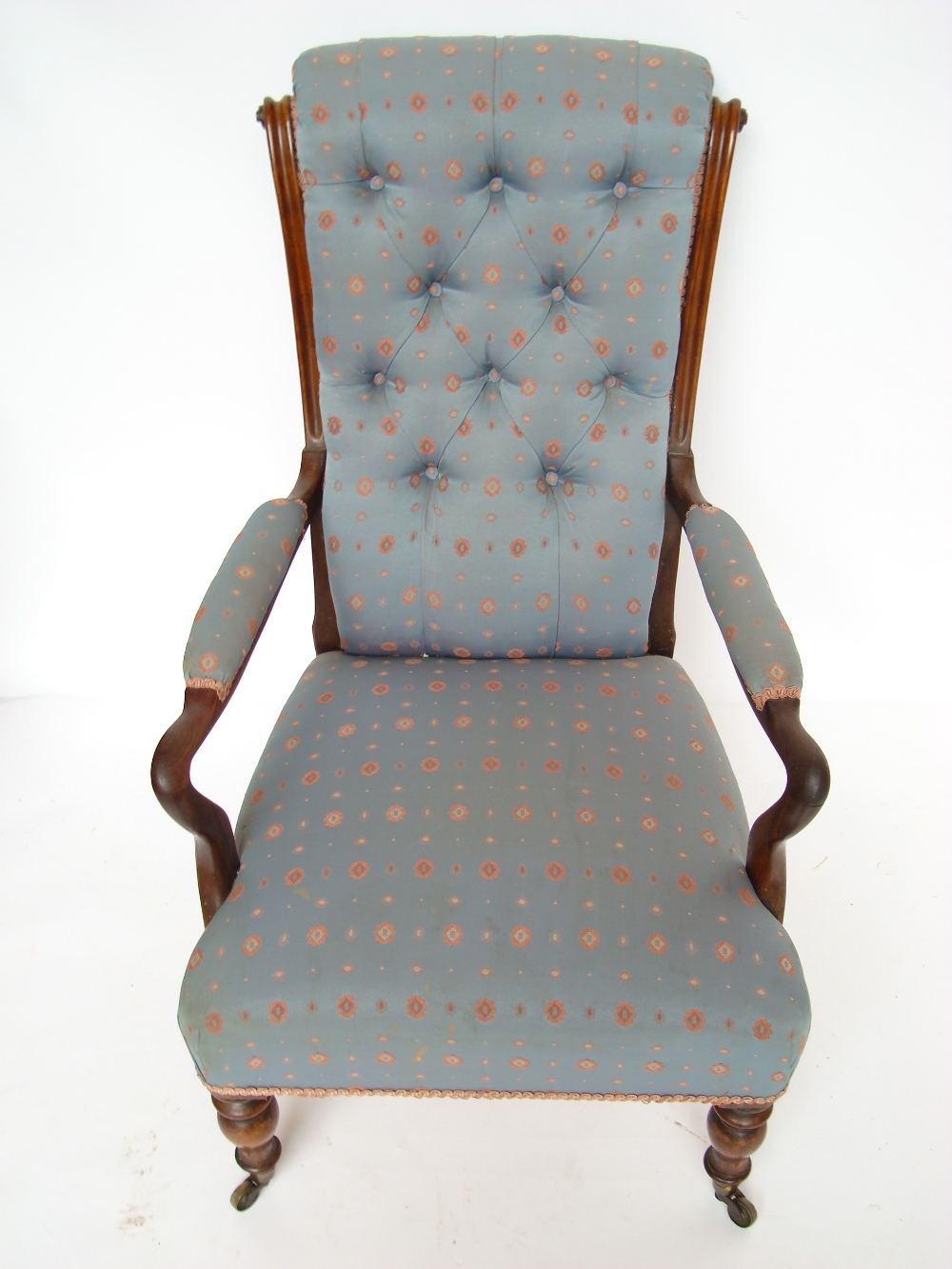 A William IV rosewood armchair, the scro