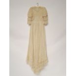 An Edwardian lace tea gown.