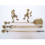 A pair of brass andirons with ball and c