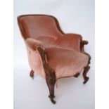 A Victorian mahogany upholstered armchai