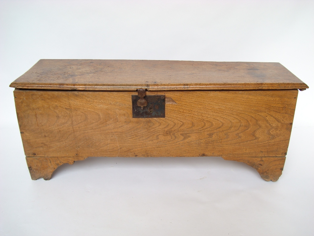 An 18th Century elm six plank chest, the