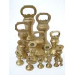 A graduated set of fifteen brass bell we