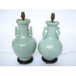 Two Chinese celadon glazed twin handled