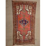 An early 20th Century Hamadan rug.  104