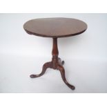 A George III mahogany tripod table, the