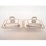 A pair of EPNS entree dishes and covers,