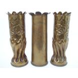 A pair of WWI Trench Art brass shell cas