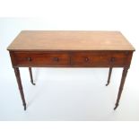 An early 19th Century mahogany writing t