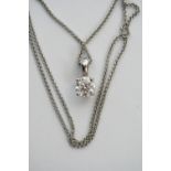 A diamond solitaire pendant, the approx