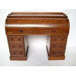 A Victorian mahogany twin pedestal cylin