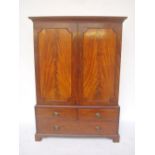 A George III mahogany linen press.  The