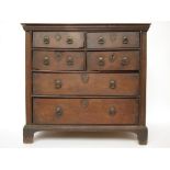 An early 18th Century oak chest of drawe