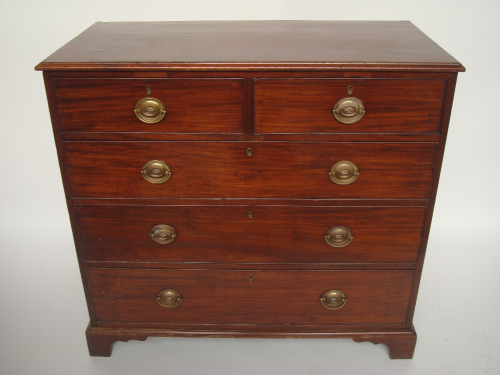 A George III mahogany chest of drawers,