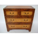 An early 19th Century mahogany and leather campaign chest of drawers, brass bound,