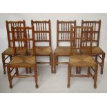 A set of six Lancashire beech and ash spindle back dining chairs,