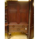 An early George III mahogany cupboard on stand,