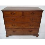 A George III mahogany chest of drawers,