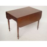 An early 19th Century large mahogany Pembroke table,