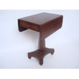 An early Victorian mahogany pedestal pembroke table,