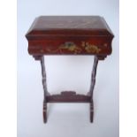 A Chinese red lacquer work table, decorated in gilt with pheasants, prunus and peonies,
