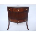 A George III mahogany corner washstand,