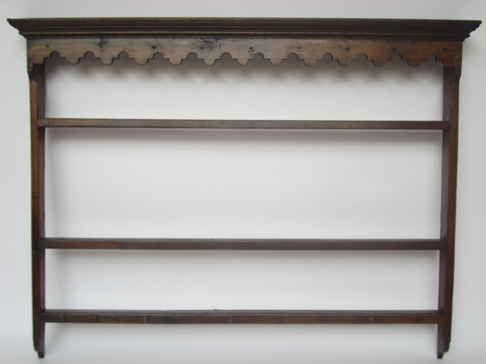 A George III oak and pine hanging plate rack,