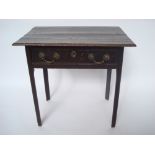 A George II oak side table, the rectangular two plank top with moulded edge above a frieze drawer,