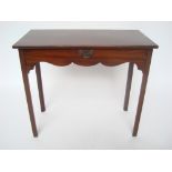 An early George III mahogany side table,