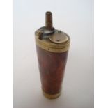 An early 19th Century copper and brass mounted combination powder flask,