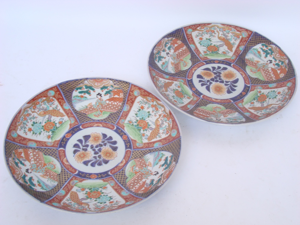 A pair of late 19th/early 20th Century Jasperware Imari chargers,iron red seal mark, 46cm diameter.