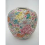 A Chinese famille rose mille fleur decorated vase, of ovoid form, Qianlong six character mark,