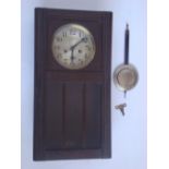 An early 20th Century Gustav Becker oak cased eight day striking wall clock,