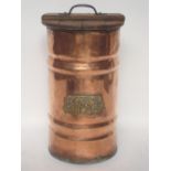 An early 20th Century large copper log bin with embossed brass plaque and wooden lid.