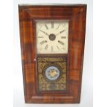 A late 19th Century walnut cased striking wall clock, with glazed door,