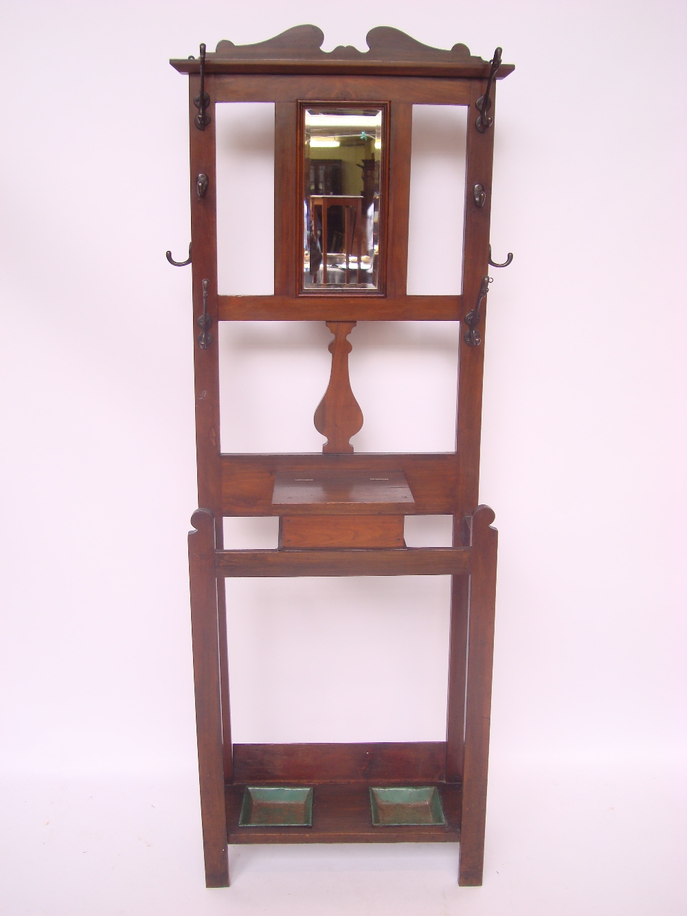 An Edwardian walnut hall stand,