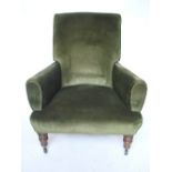 A late Victorian upholstered easy armchair,