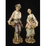 A pair of late 19th Century Continental Meissen style porcelain figures,