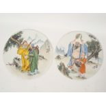 A pair of Chinese circular porcelain plaques,